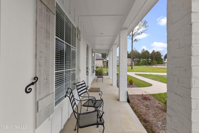 view of patio featuring a porch