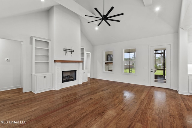 unfurnished living room featuring ceiling fan, a fireplace, high vaulted ceiling, wood finished floors, and baseboards