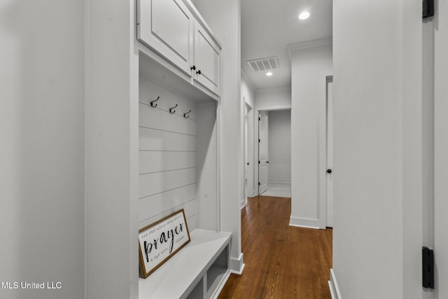 mudroom with recessed lighting, visible vents, dark wood-style flooring, and baseboards