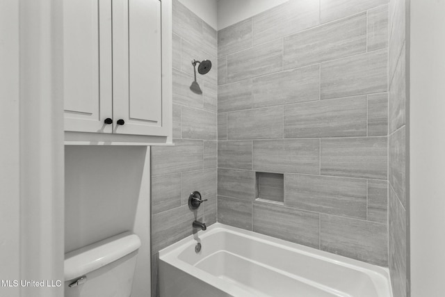 bathroom with toilet and shower / bath combination