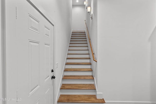 staircase with baseboards