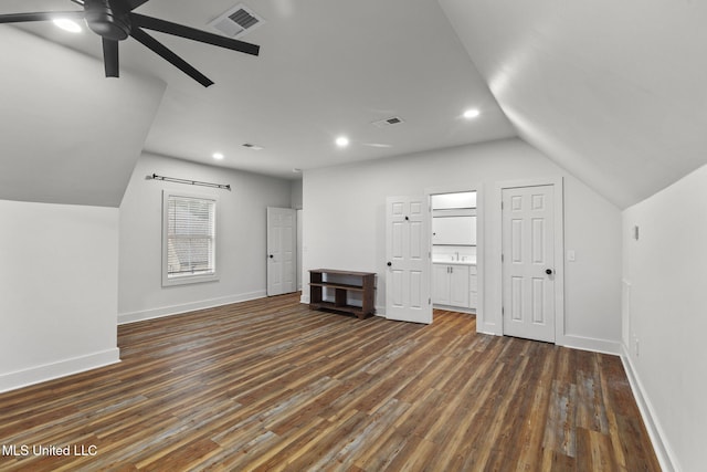 bonus room with visible vents, ceiling fan, lofted ceiling, and dark wood-style floors