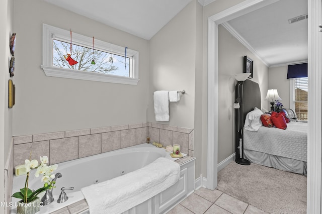 bathroom featuring visible vents, plenty of natural light, ensuite bathroom, and tile patterned flooring