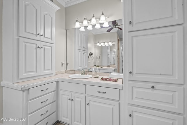 bathroom featuring vanity and crown molding