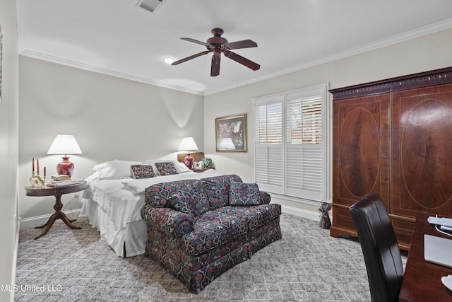 bedroom featuring crown molding, carpet flooring, baseboards, and visible vents