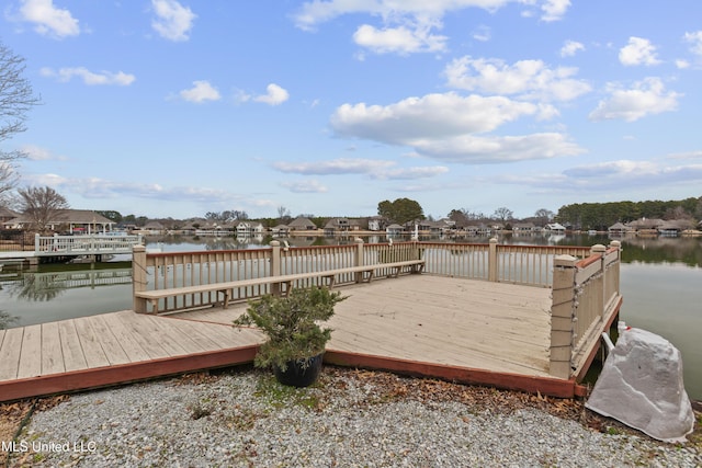 dock area featuring a deck with water view