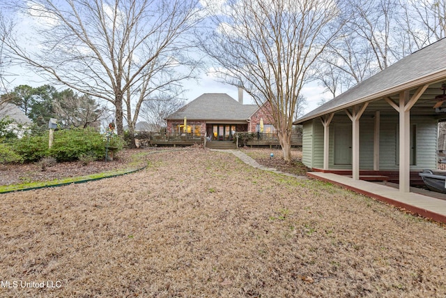 view of yard with a deck