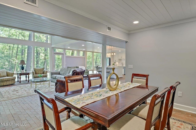 1844 Eastover Dr, Jackson, MS 39211 - dining room featuring ornamental molding, recessed lighting, a chandelier, and visible vents