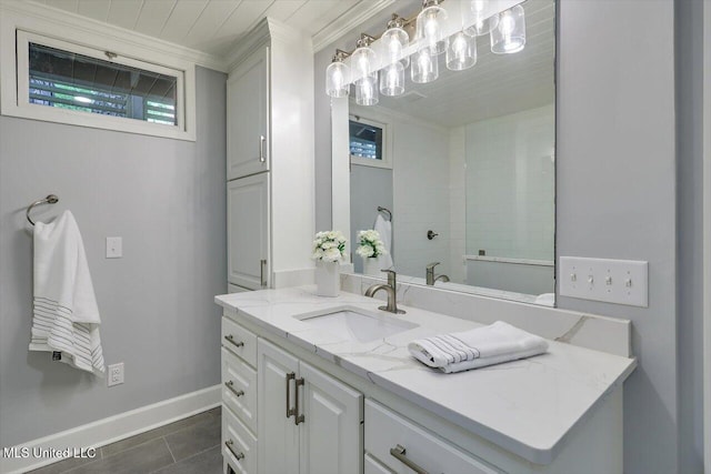 1844 Eastover Dr, Jackson, MS 39211 - full bath with tile patterned flooring, ornamental molding, baseboards, and vanity