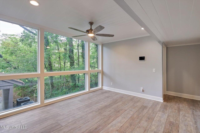 1844 Eastover Dr, Jackson, MS 39211 - spare room with wood-type flooring, baseboards, crown molding, and ceiling fan