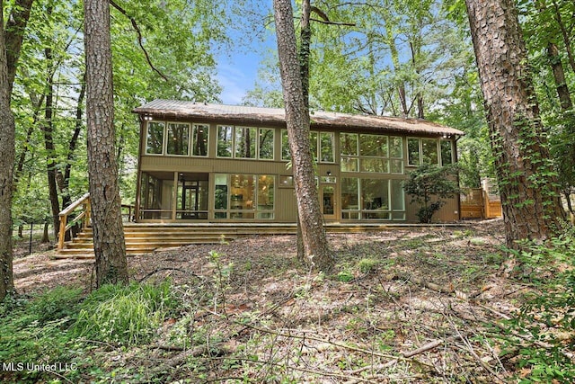 1844 Eastover Dr, Jackson, MS 39211 - back of house with stairs and a sunroom