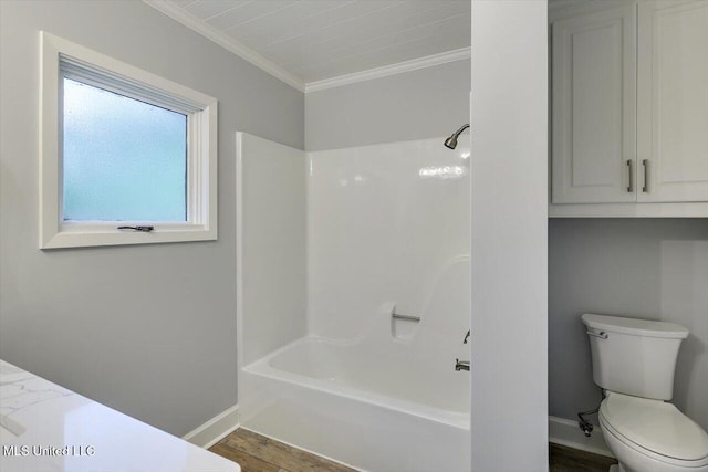 1844 Eastover Dr, Jackson, MS 39211 - full bathroom featuring bathtub / shower combination, wood finished floors, baseboards, toilet, and ornamental molding