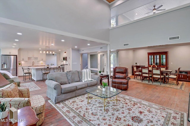1844 Eastover Dr, Jackson, MS 39211 - living area featuring a high ceiling, recessed lighting, and visible vents