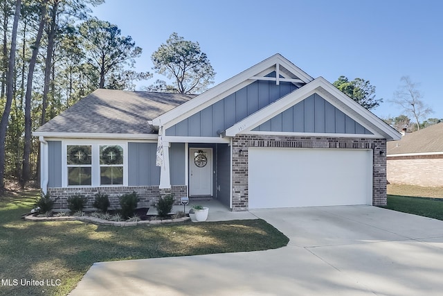 craftsman-style house featuring a front yard and a garage