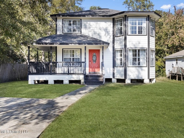 view of front of house with a front lawn and a porch