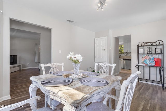 2869 Honduras Dr, Gautier, MS 39553 - dining area featuring wood finished floors and baseboards