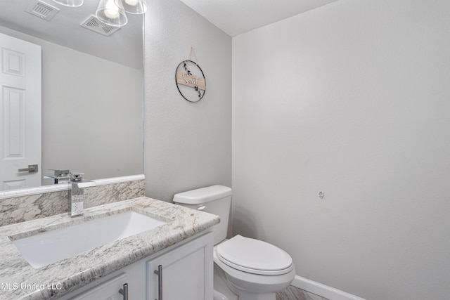 2869 Honduras Dr, Gautier, MS 39553 - bathroom with toilet and vanity