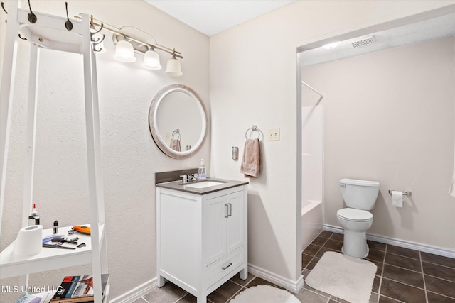 bathroom with tile patterned flooring, visible vents, baseboards, toilet, and vanity