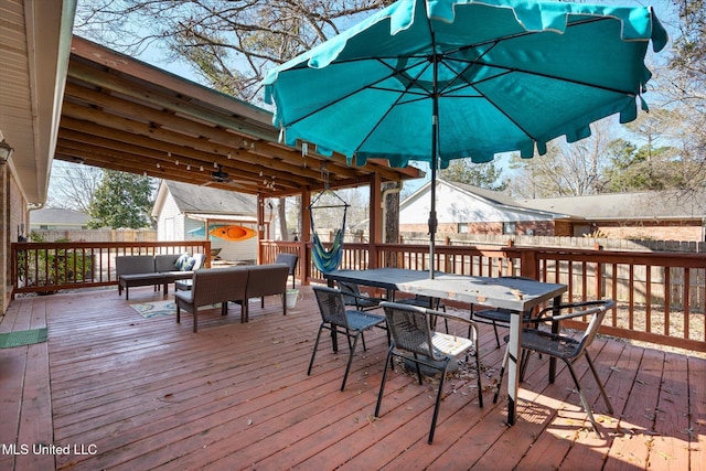 deck with an outdoor hangout area and outdoor dining area