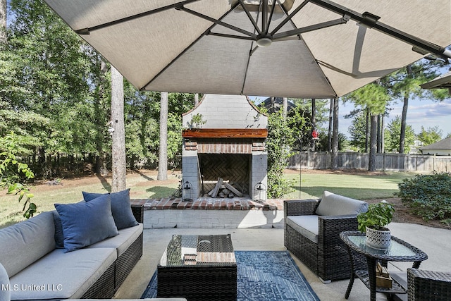 101 Lake Village Dr, Madison, MS 39110 - view of patio featuring fence and an outdoor living space with a fireplace