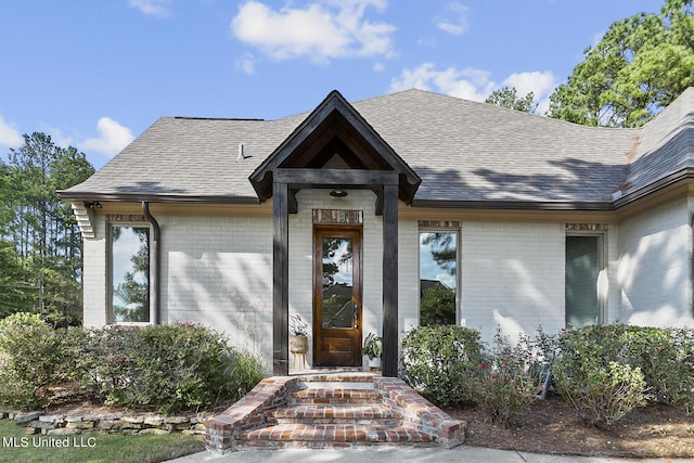 101 Lake Village Dr, Madison, MS 39110 - entrance to property featuring roof with shingles and brick siding
