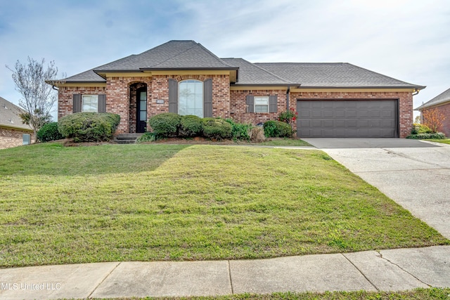 view of front facade featuring concrete driveway, brick siding, a front lawn, a shingled roof, and a garage
