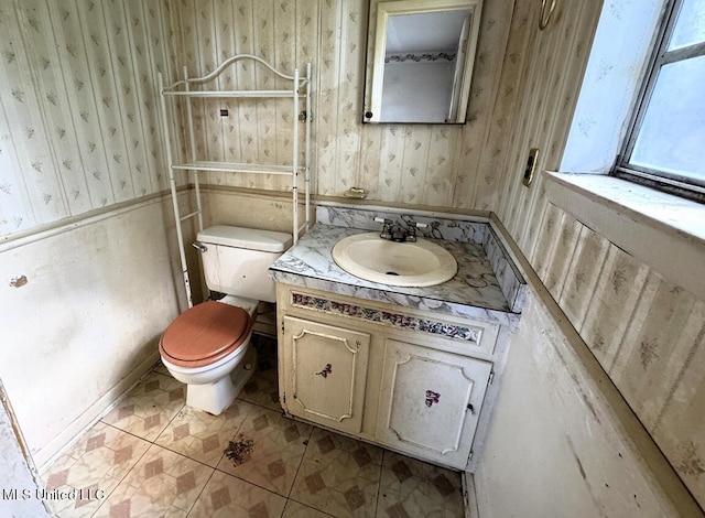 208 Cedar Dr, Diberville, MS 39540 - bathroom featuring vanity and wallpapered walls