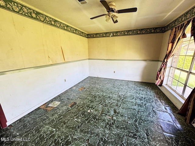 208 Cedar Dr, Diberville, MS 39540 - spare room featuring a ceiling fan