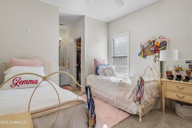 bedroom with a closet, ceiling fan, and carpet