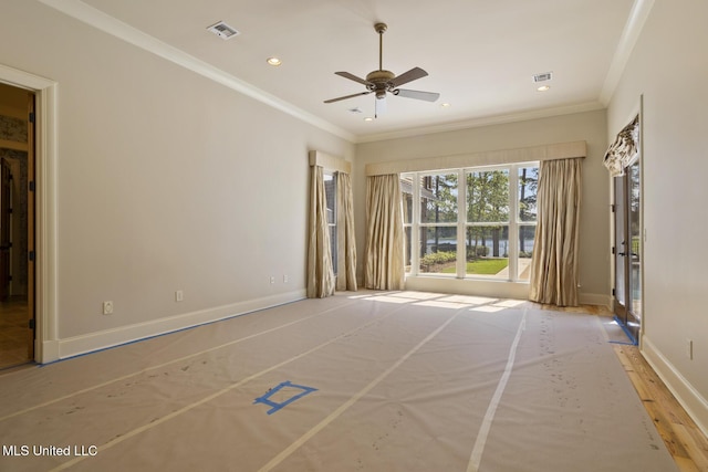 spare room with ceiling fan, recessed lighting, visible vents, and crown molding