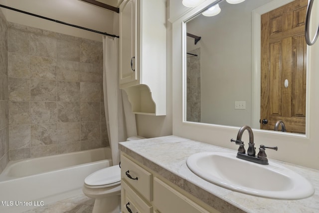 bathroom featuring toilet, shower / tub combo with curtain, and vanity