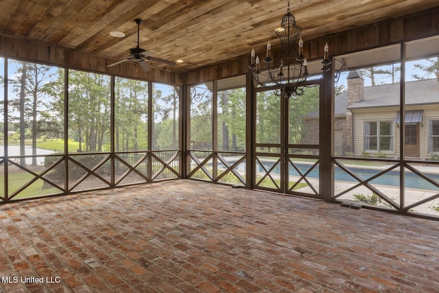 unfurnished sunroom with a chandelier
