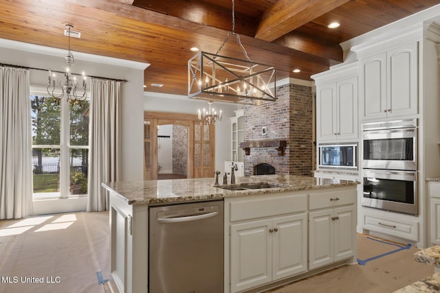 kitchen featuring wooden ceiling, a notable chandelier, and appliances with stainless steel finishes
