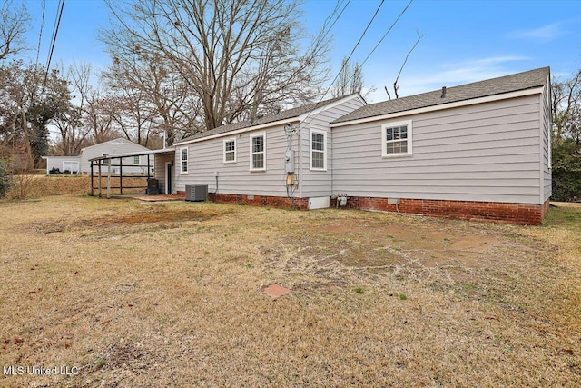 127 Autumn Dr, Vicksburg, MS 39180 - rear view of property featuring crawl space, central AC unit, and a yard