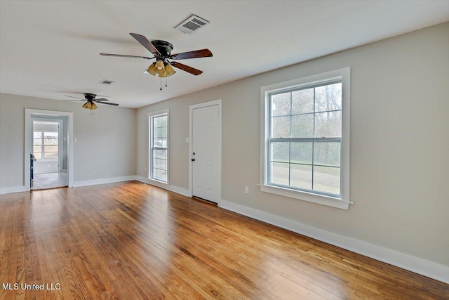 127 Autumn Dr, Vicksburg, MS 39180 - interior space featuring a healthy amount of sunlight, baseboards, visible vents, and hardwood / wood-style floors