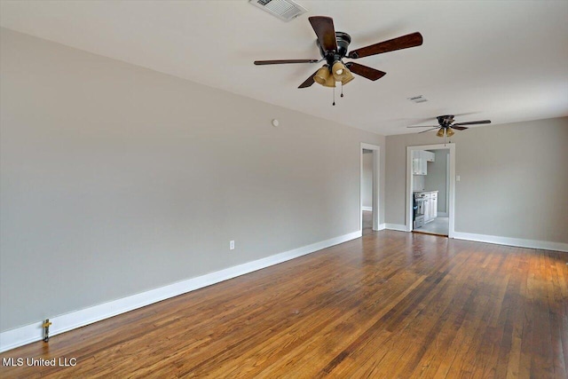 127 Autumn Dr, Vicksburg, MS 39180 - unfurnished room with a ceiling fan, visible vents, baseboards, and wood finished floors
