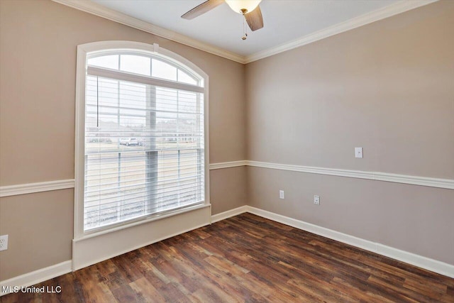 unfurnished room with crown molding, dark wood-type flooring, and ceiling fan