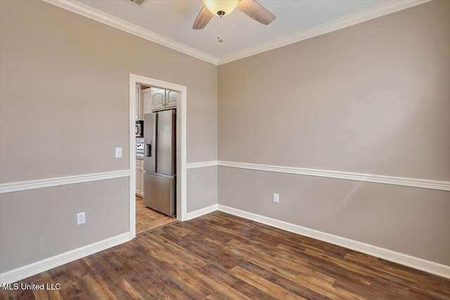 empty room featuring hardwood / wood-style flooring, ornamental molding, and ceiling fan