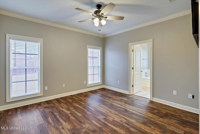 empty room featuring ornamental molding, ceiling fan, and dark hardwood / wood-style flooring