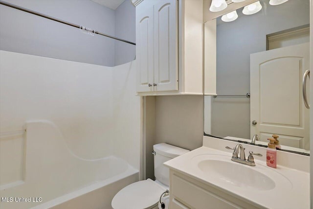 full bathroom with vanity, shower / bathtub combination, and toilet