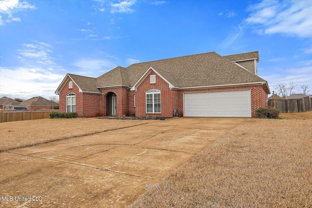 view of front of property with a garage