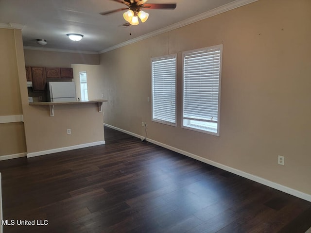 unfurnished living room with baseboards, a ceiling fan, and dark wood-style floors