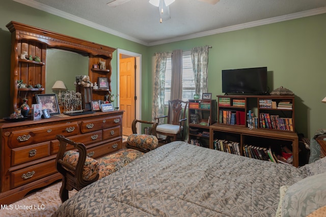 bedroom with ceiling fan, ornamental molding, and a textured ceiling