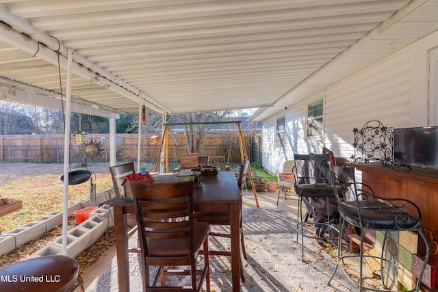 view of patio / terrace featuring an outdoor bar