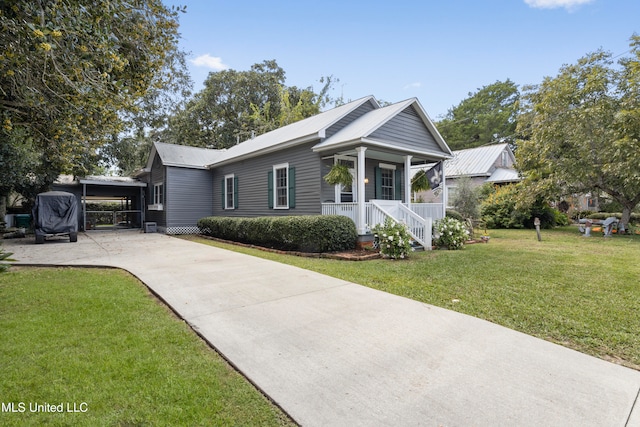 view of front of home featuring a front yard and a porch