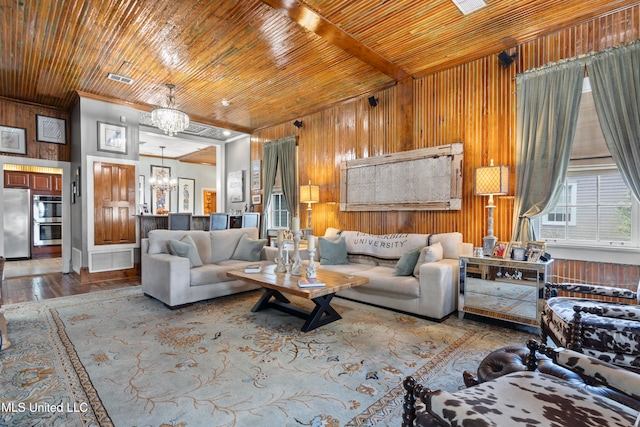 living room featuring wood walls, a notable chandelier, wooden ceiling, and hardwood / wood-style floors