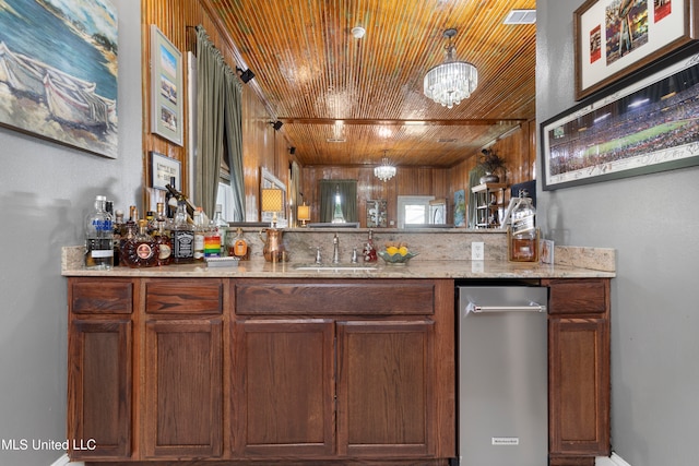 bar with wood ceiling, a notable chandelier, tasteful backsplash, and sink