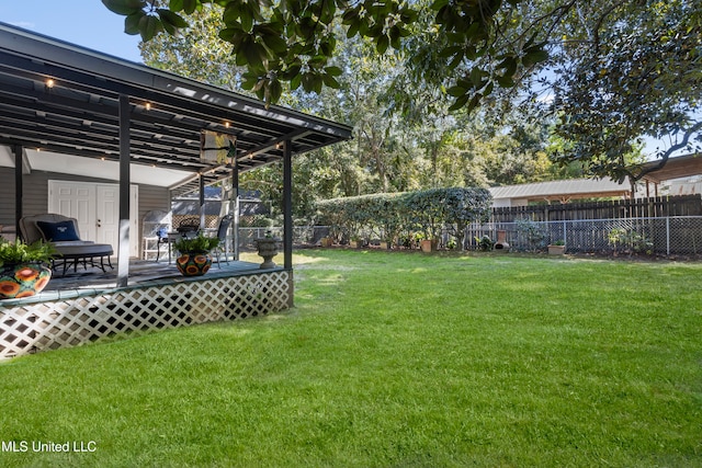 view of yard featuring a deck