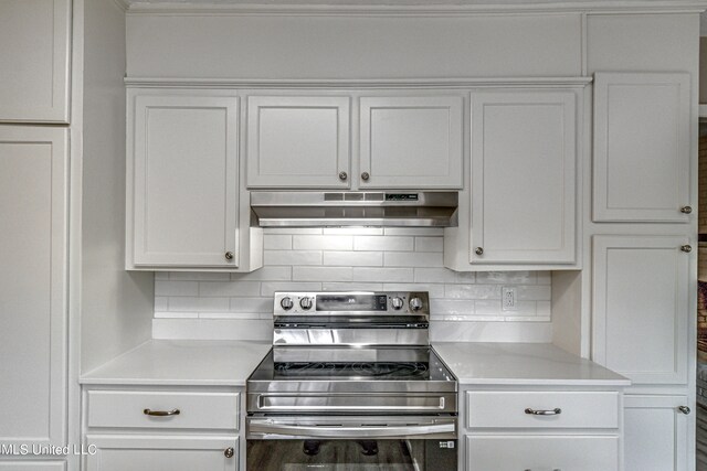 kitchen with white cabinetry, electric stove, and decorative backsplash