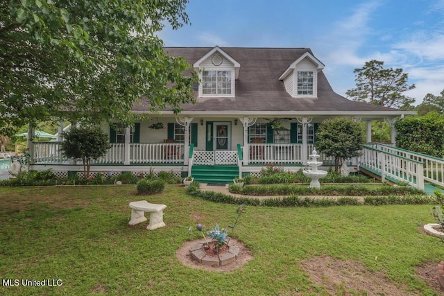 view of front facade with a porch and a front yard